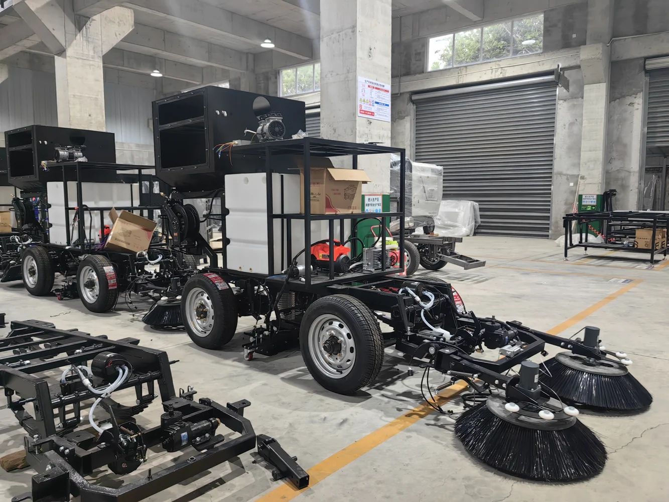 Electric sweeper chassis during assembly