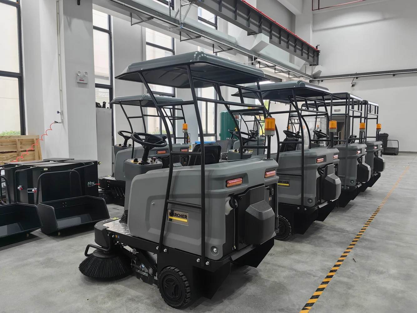 Finished electric sweepers in a workshop